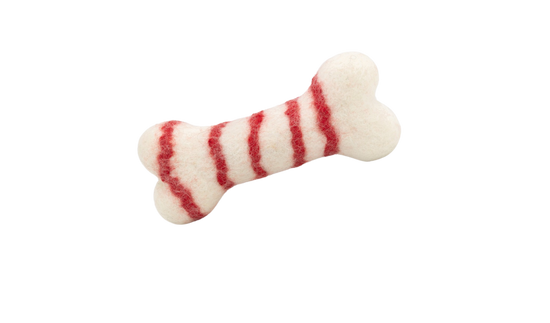 Dog bone toy with red stripes on a white background