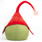 Green gnome with a red hat on a white background