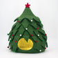 Green felt Christmas tree decoration with red and gold details on a white background