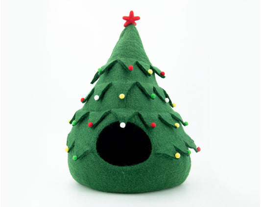 Green felt Christmas tree-shaped pet bed with decorative lights on a white background
