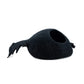Black cat bed with a bow on a white background
