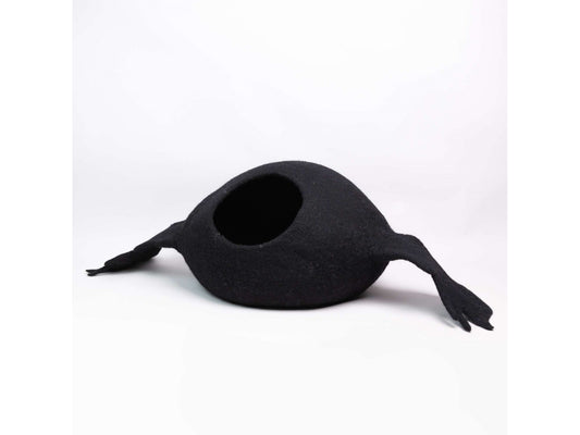Black cat bed shaped like a duck on a white background