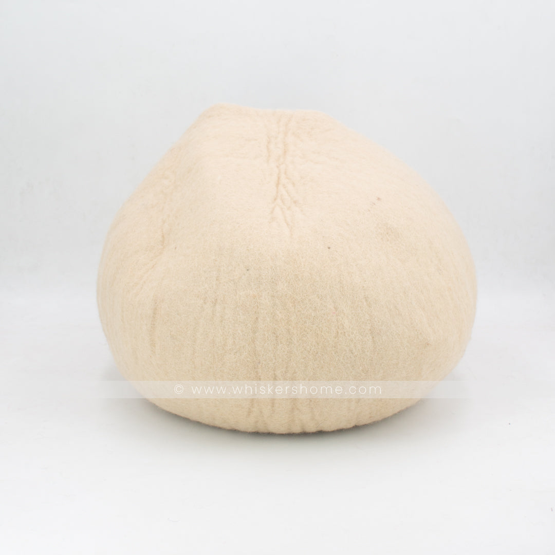 Back view of round light brown felt cat cave for indoor cats