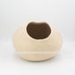 Front view of light brown felt cat cave made from 100% New Zealand wool