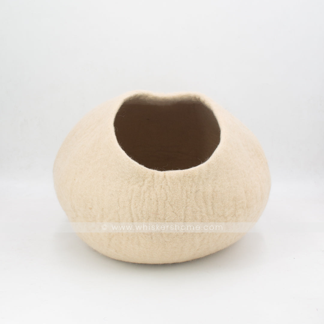 Front view of light brown felt cat cave made from 100% New Zealand wool